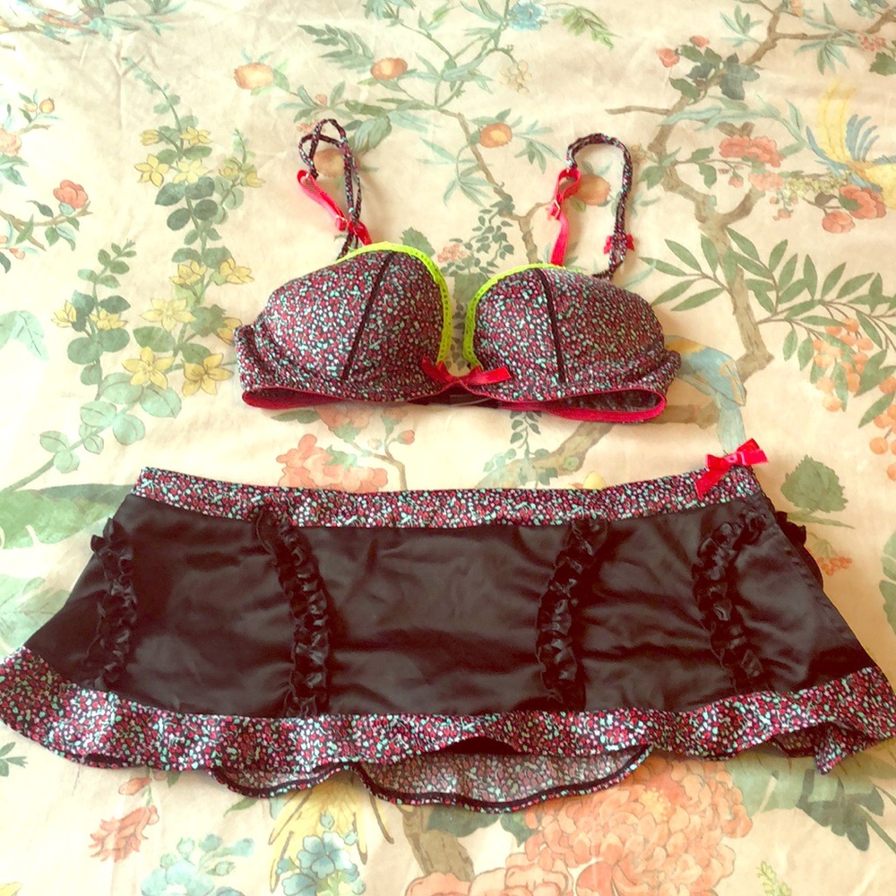 NOT FOR SALE/ Victoria’s Secret black floral bra and skirt set.
